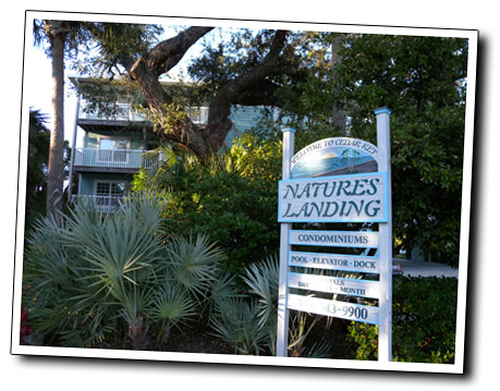 the entrance sign of Natures Landing condominiums